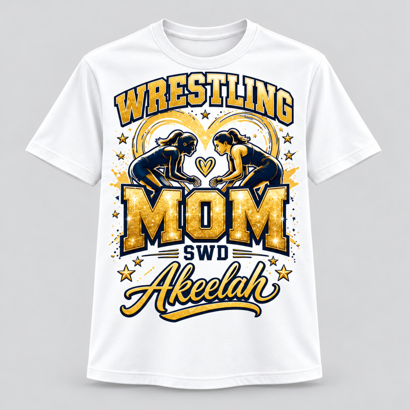 White t-shirt printed with a gold and navy WRESTLING MOM design, two wrestlers, SWD and the name Akeelah