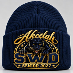 Navy cuffed knit cap with the student’s name embroidered in gold script above a panther, SWD and a Senior 2027 banner